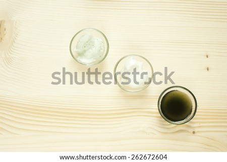 spa setting with bath salts on wooden table, directly above