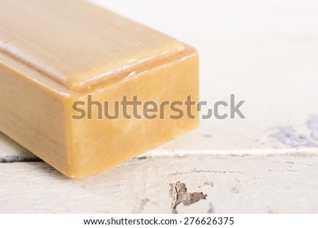 organic soap on old bright wood background