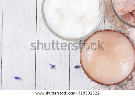cosmetic cream and lavender on white wood table background