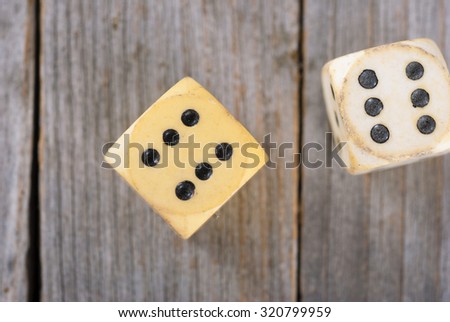 two dices on wood table