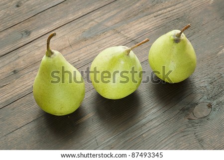pears on wooden table, autumnal still life