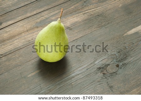 green pear on table