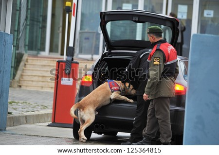 ISTANBUL, TURKEY - DECEMBER 28: Vehicles and cars that arrive in Silivri courthouse in Istanbul are searched by sniffer dogs and detectors on December 28, 2010 in Istanbul, Turkey.