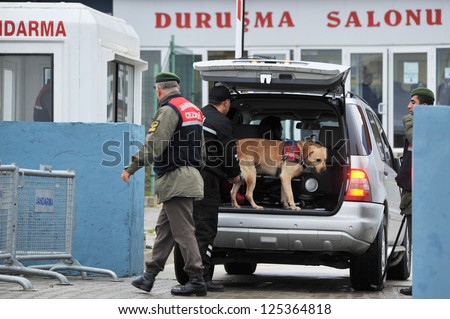 ISTANBUL, TURKEY - DECEMBER 28: Vehicles and cars that arrive in Silivri courthouse in Istanbul are searched by sniffer dogs and detectors on December 28, 2010 in Istanbul, Turkey.