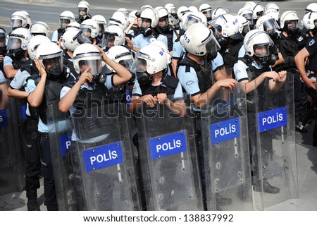 ISTANBUL, TURKEY - MAY 16: Turkish police tries hard to stop the students protesting against the government on May 16, 2013 in Istanbul, Turkey.