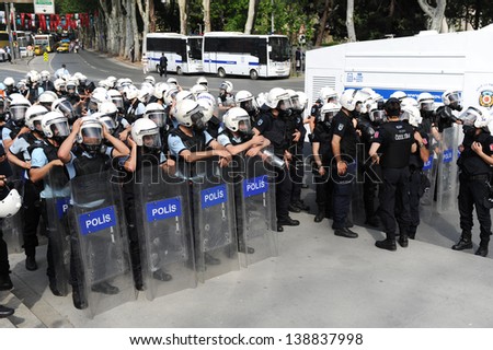 ISTANBUL, TURKEY - MAY 16: Turkish police tries hard to stop the students protesting against the government on May 16, 2013 in Istanbul, Turkey.