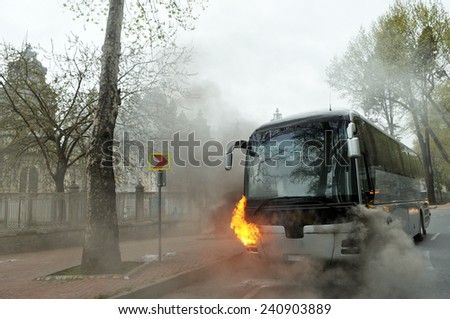 ISTANBUL, TURKEY - APRIL 20: Tourist bus burned in front of Dolmabahce Palace on April 20, 2013 in Istanbul, Turkey.