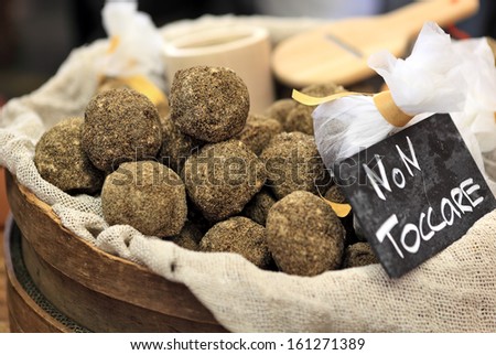 Small Swiss hard cheese balls made from cow\'s milk on International Cheese Festival in Bra, Northern, Italy.
