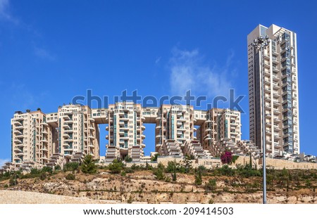 JERUSALEM, ISRAEL - JULY 13, 2014: Holyland Towers - complex of modern luxury apartment buildings with magnificent view of Jerusalem. Construction began in 1995 on ancient Bronze Age burial ground.