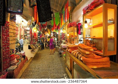 JERUSALEM - AUGUST 21: Bazaar in Old City offers variety of middle east traditional products and souvenirs. It is very popular with tourists and pilgrims visiting Jerusalem.