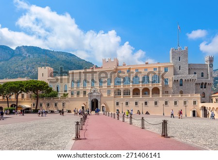 MONACO-VILLE, MONACO -  JULY 27, 2013: Square and facade view of the palace - official residence of Prince of Monaco. It is one of the major tourist attraction and remains fully working palace.