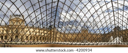 Panoramic view on structure of famous Pyramid in Louvre museum from inside the pyramid in Paris, France.