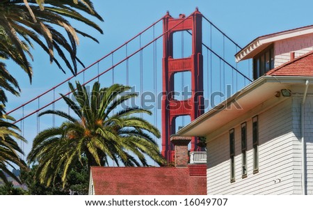 Architectural fragments of famous Golden Gate Bridge and wooden house in San Francisco, USA.