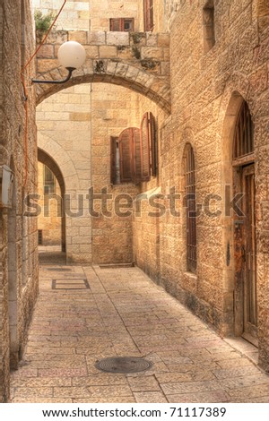 Vertical oriented image of old street in historic part of Jerusalem, Israel.