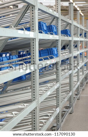 The image of shelves in the industrial warehouse
