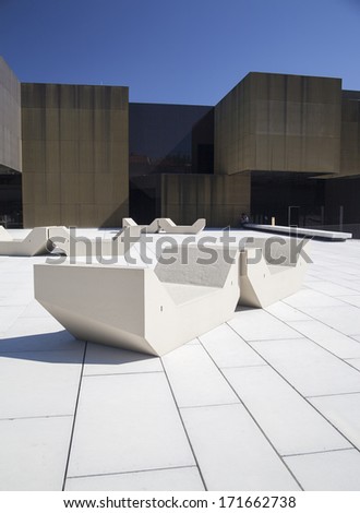GUIMARAES, PORTUGAL - MAY 24: benches in front of Arts and Creative Platform designed by Pitagoras Arquitectos in Guimaraes, Portugal on May 24, 2013.