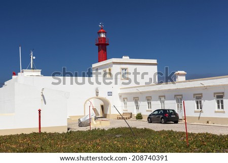 CASCAIS, PORTUGAL - JULY 22: Cabo Raso lighthouse and fort of Saint Bras near Guincho beach in Cascais-Sintra area, Portugal on July 22, 2014.