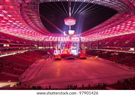 WARSAW - JANUARY 29: Visitors at the grandstand, during The Grand Open Day at the National Stadium and a performance by the Polish band Lady Pank on January 29, 2012 in Warsaw, Poland.