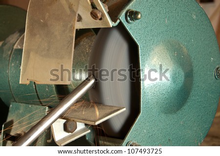 Sparks while grinding metal on a grinding wheel