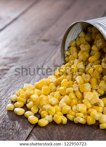 Canned Corn on wooden background