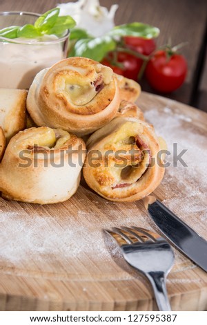 Portion of Pizza Bread on a wooden table