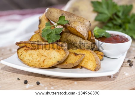 Fresh homemade Potato Wedges with parsley