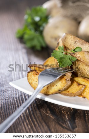 Fresh homemade Potato Wedges with parsley