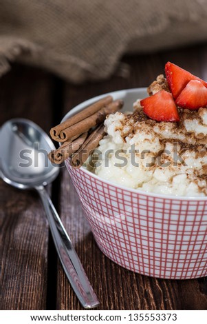 Fresh homemade Rice Pudding topped with fruits