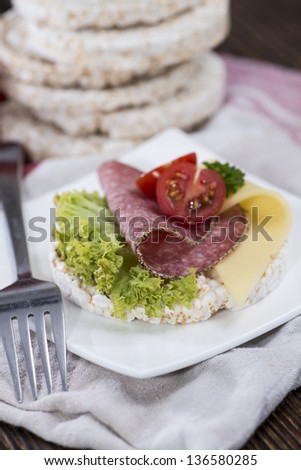 Diet food (rice cakes with healthy topping on a plate)