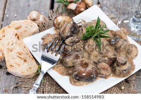 Small Plate with Cream Mushrooms and fresh Herbs
