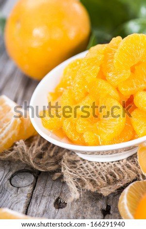 Some Canned Tangerines with fresh fruits