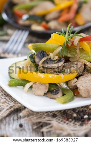 Mixed Vegetables with Meat (chicken) on vintage background