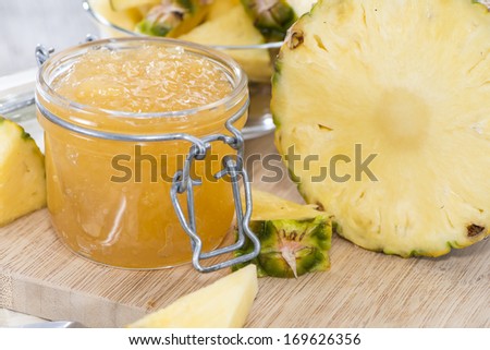 Portion of fresh made Pineapple Jam with some fresh fruits