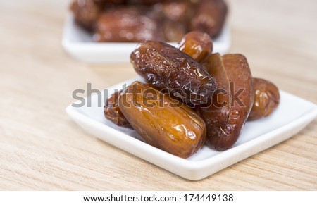Heap of fresh dried dates in a bowl