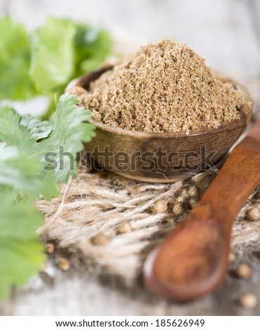 Small bowl with Coriander Powder (detailed close-up shot)