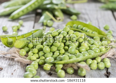 Small portion of fresh harvested Peas (close-up shot)