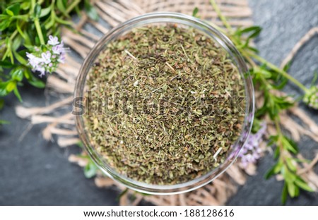 Portion of dried Winter Savory in a small bowl