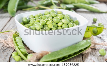 Small portion of fresh harvested Peas (close-up shot)