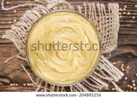 Small bowl with Mustard sauce (close-up shot)
