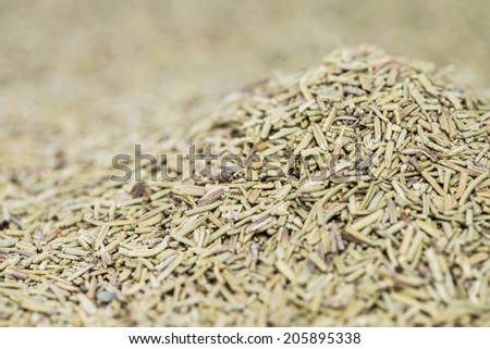 Heap of dried Rosemary (detailed close-up shot for background use)