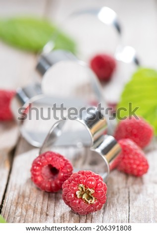 Portion of fresh Raspberries (detailed close-up shot)