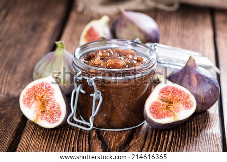 Fig Marmalade in a glass (detailed close-up shot)