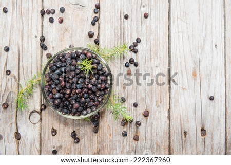 Portion of Juniper Berries on vintage wooden background