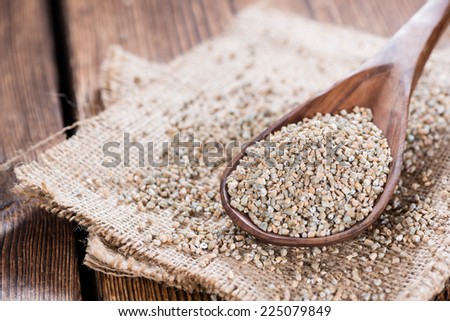 Portion of Rye Meal (close-up shot) on wooden background