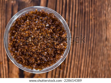 Portion of Smoked Salt on wooden background