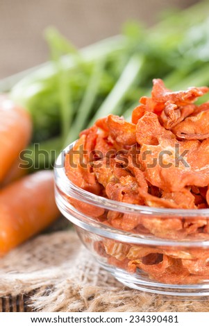 Dried vegetables (Carrots) on rustic wooden background