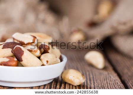 Some Brazil Nuts on vintage wooden background