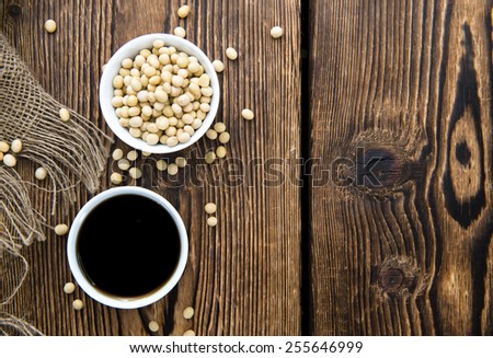 Dark Soy Sauce (close-up shot) on Bamboo background
