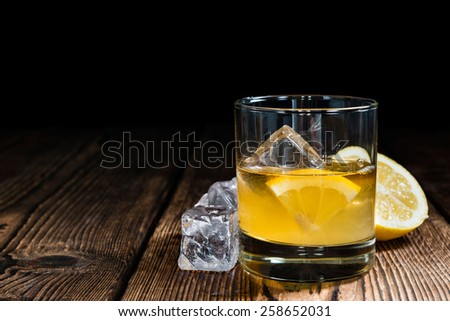 Whiskey Sour with ice cubes (close-up shot)
