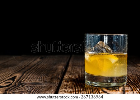 Whiskey Sour with ice cubes (close-up shot)